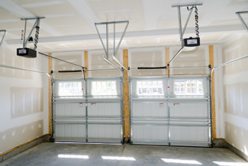 Garage doors repair service on double doors